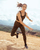 Legging de tiro alto control en abdomen y muslos en material pet reciclado#color_167-estampado-animal-print