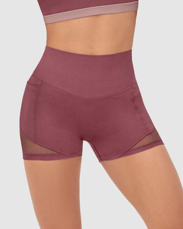 Short deportivo con bolsillos laterales Leonisa Active by Silvy Araujo#color_194-vino-pastel